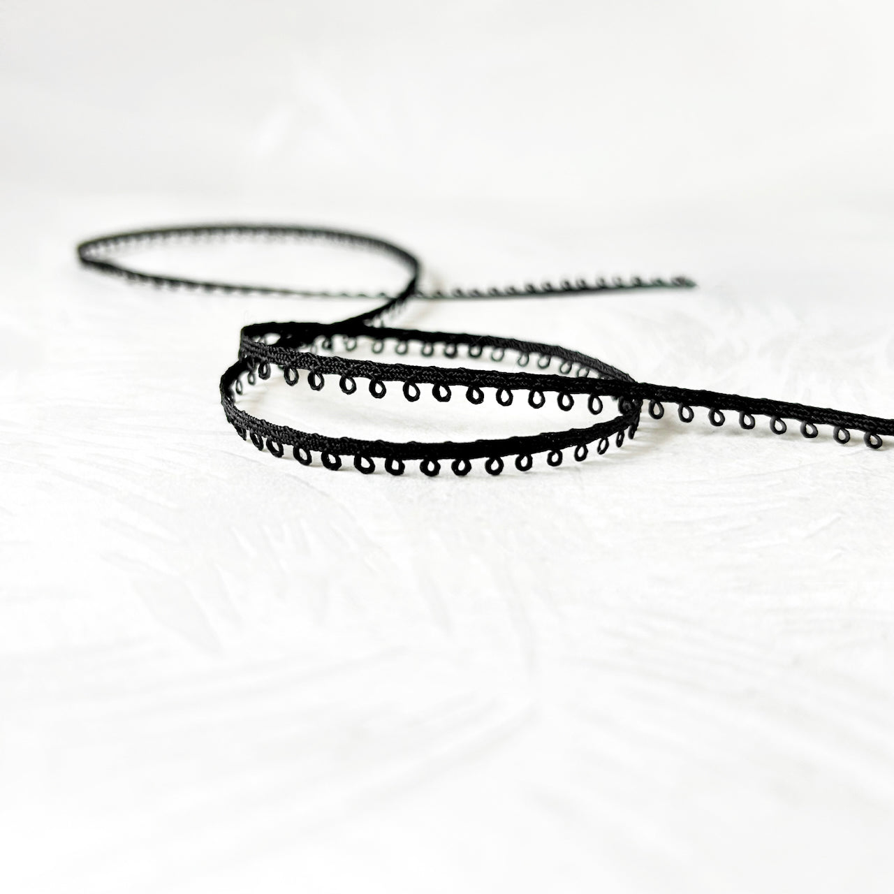 Black_Micro_Loop_Edge_Braid