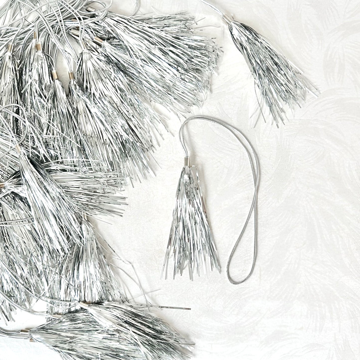 Silver Tassel Stretch Loop