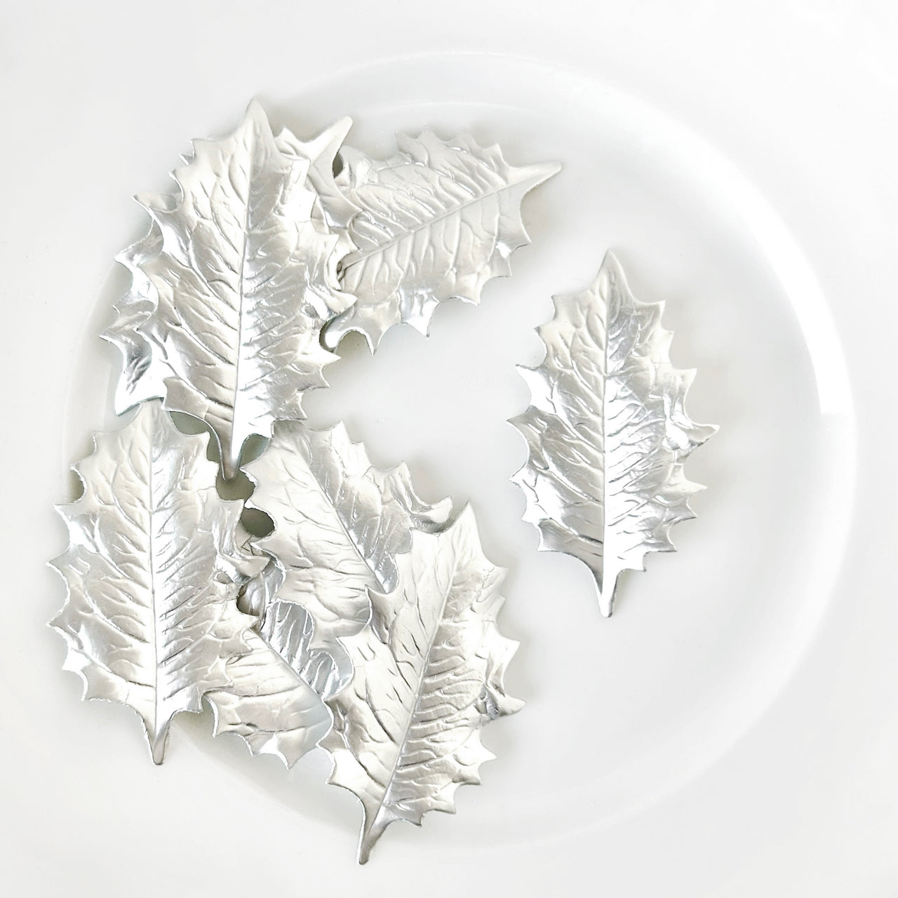    Hand_Pressed_Paper_Holly_Leaves