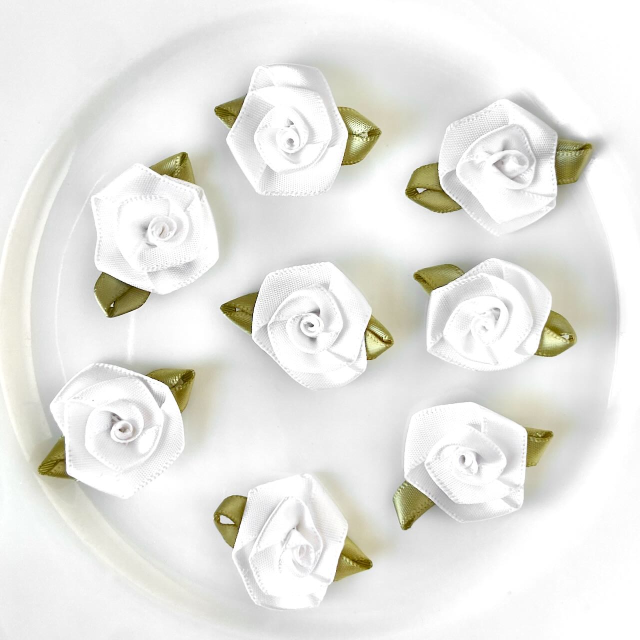 White_Ribbon_Rose_With_Leaves