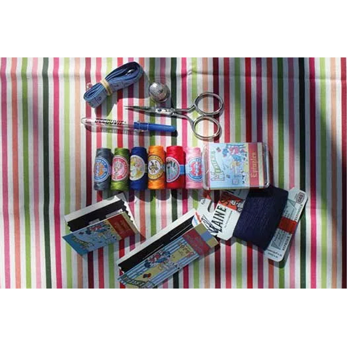 Filled sewing box - Little girl repairing her doll - Sajou