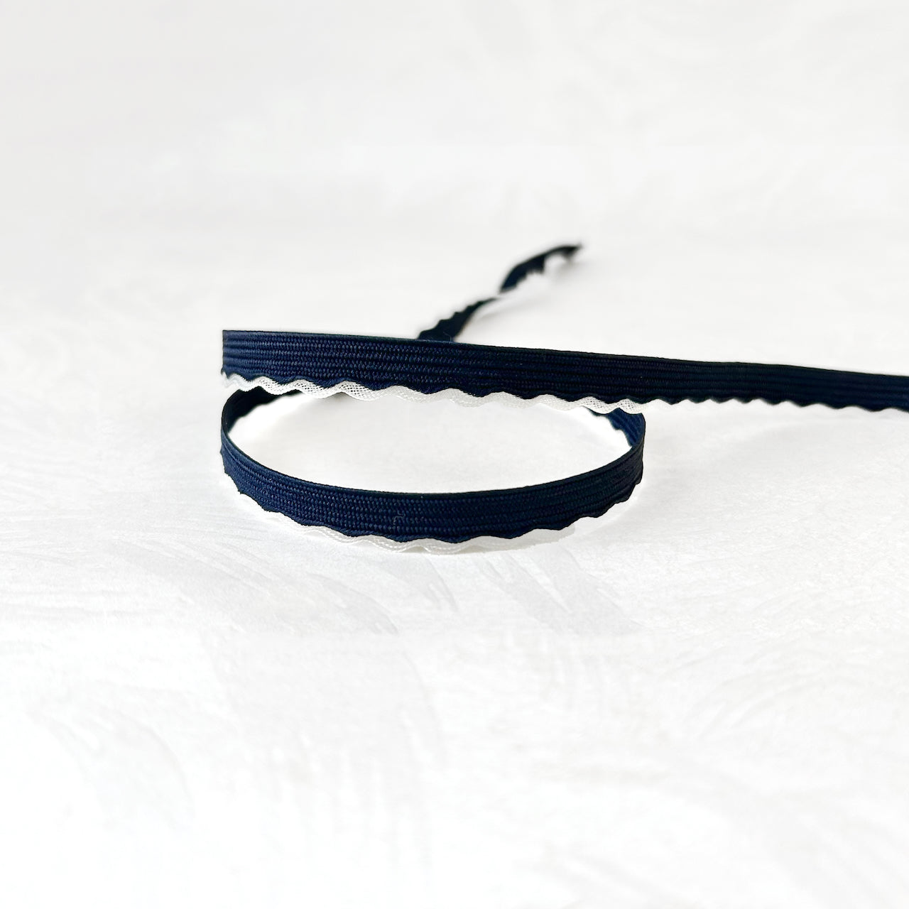 Scalloped_Filament_Edge_Braid