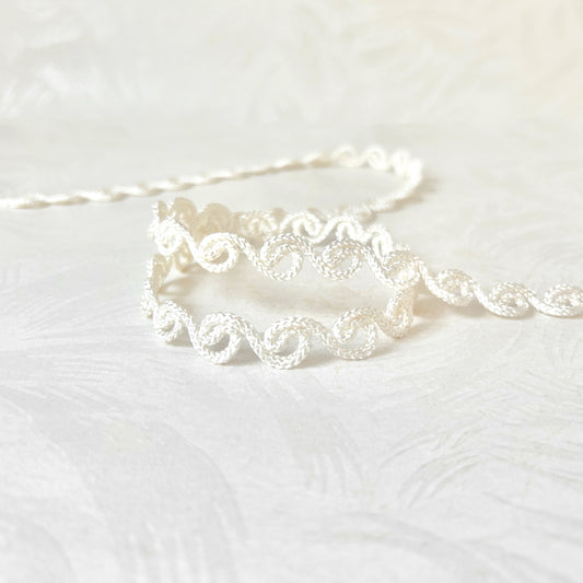 White_Scroll_Braid