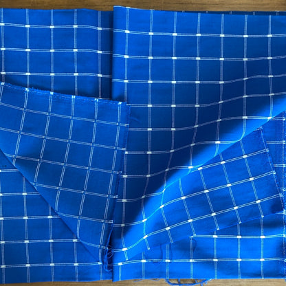 Woven Squares on Blue Fabric